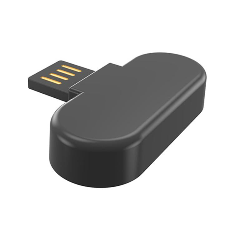 xDfind mini watch charger showing its smooth back and USB connector