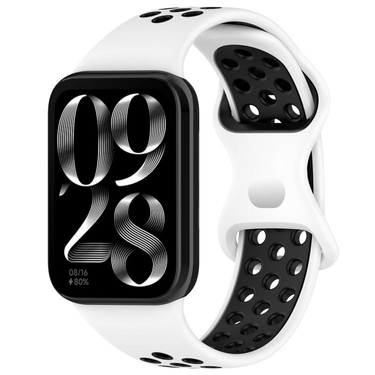 White and black perforated silicone watch band with smartwatch