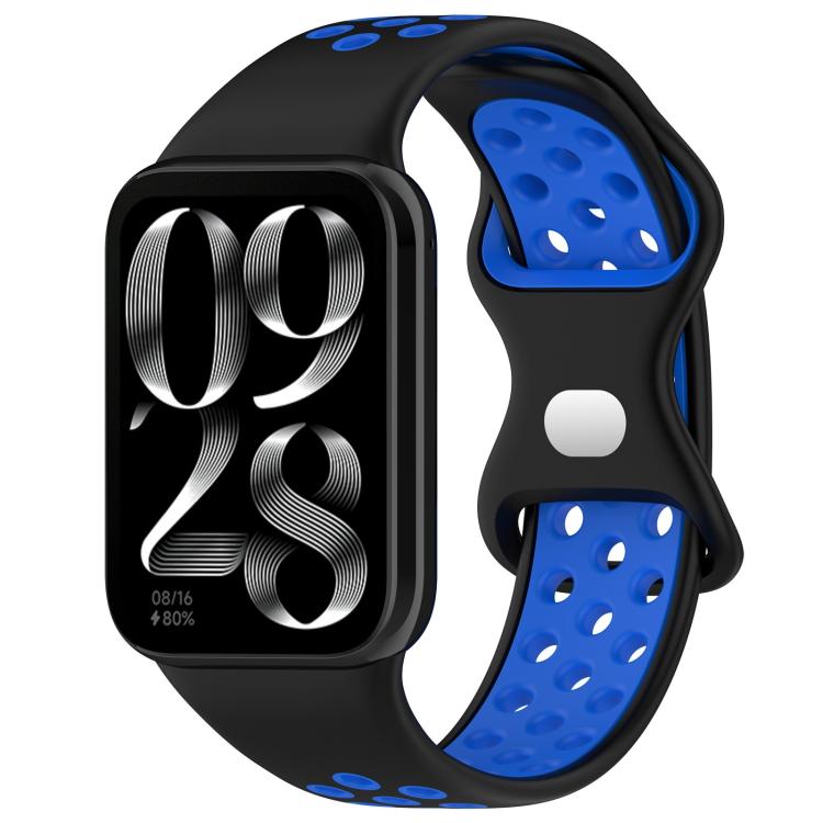Black and blue perforated silicone watch band with smartwatch
