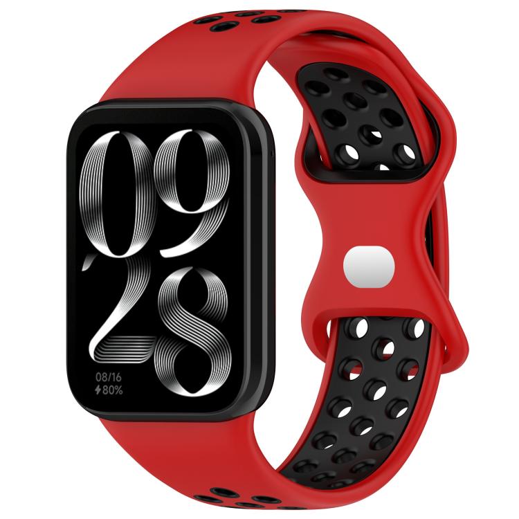 Red and black perforated silicone watch band with smartwatch
