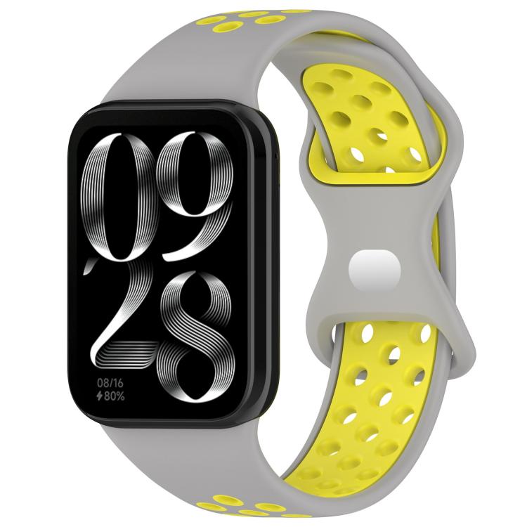 Gray silicone watch band with yellow perforated inner side and buckle