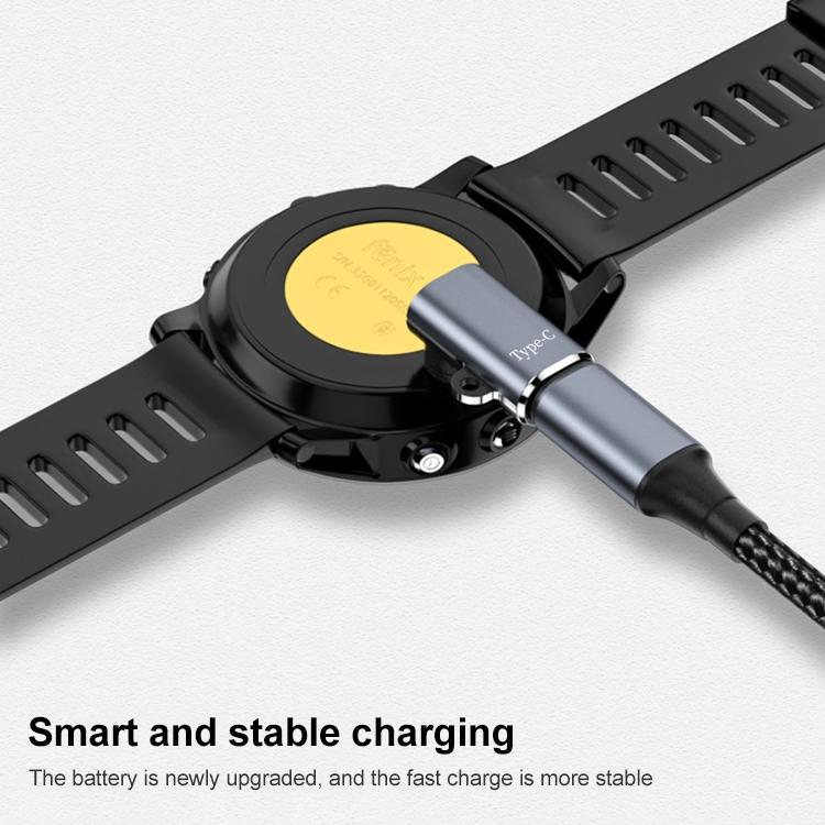 xDfind 90-degree charging adapter plugged into the back of a smartwatch and connected to a cable.