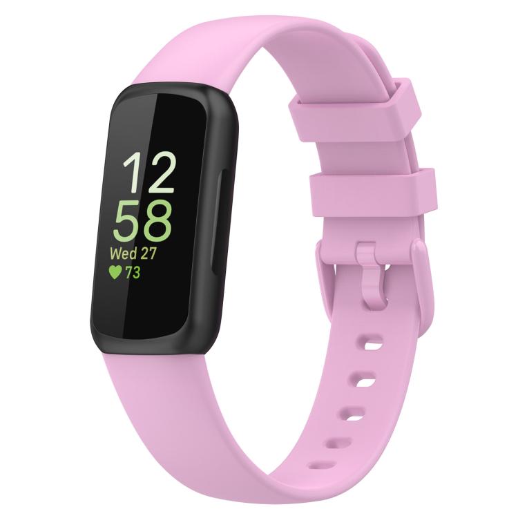 Fitbit Inspire 3 with a pink silicone watch band and black tracker