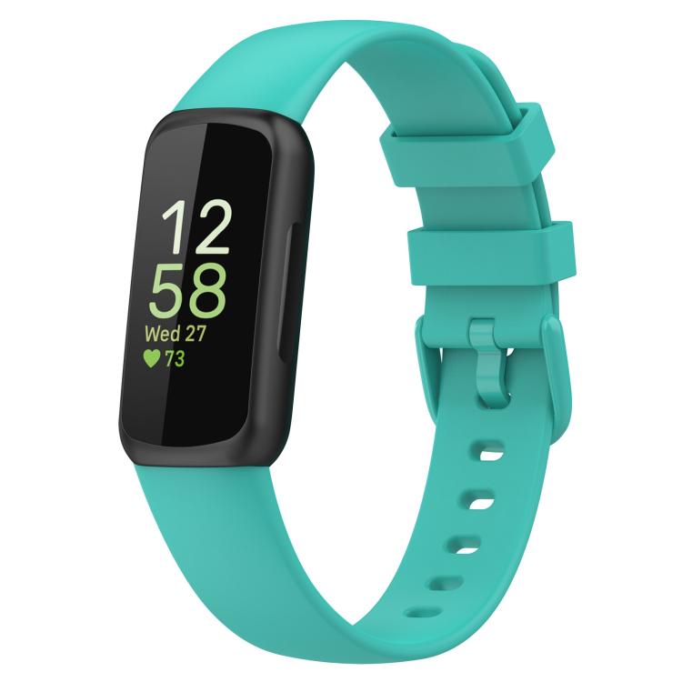Teal silicone watch band with adjustable buckle, shown fitted to a Fitbit Inspire 3