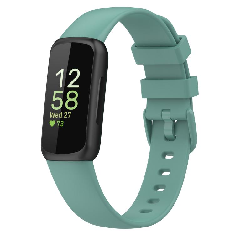 Muted teal Fitbit Inspire 3 band, showing its buckle and adjustment holes