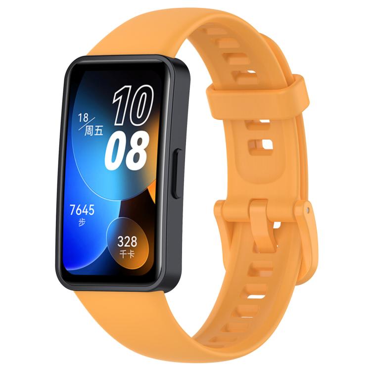 Orange silicone watch band with buckle and adjustment holes, shown attached to a smartwatch.