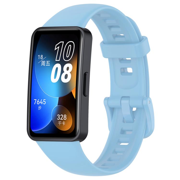 Light blue silicone watch band with buckle and adjustment holes, shown attached to a smartwatch.