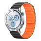 xDfind magnetic silicone watch band in black with a bright orange underside