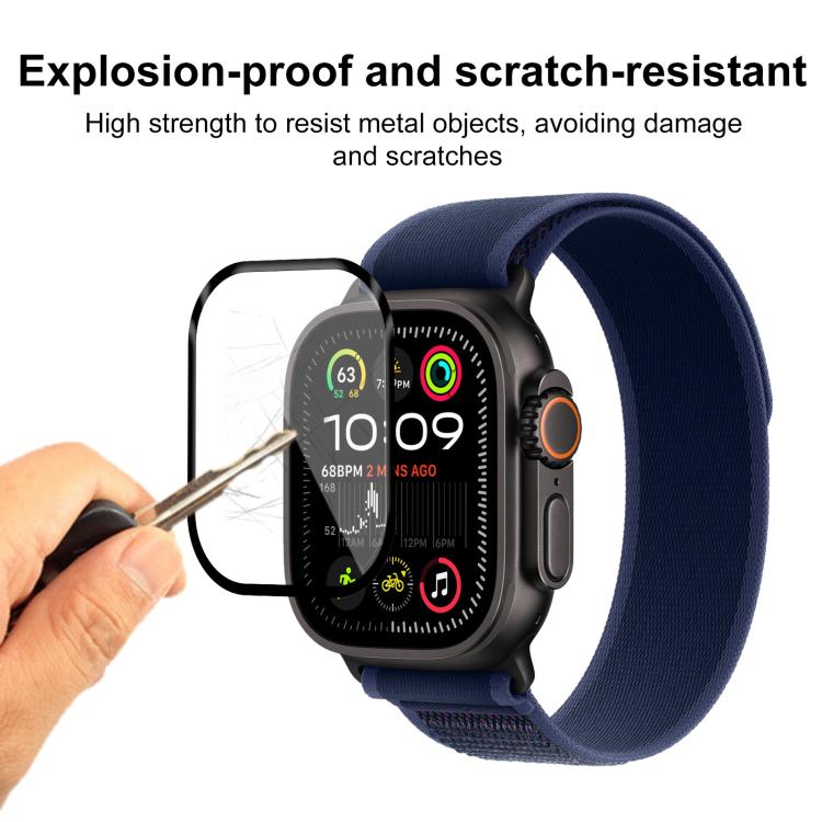 Curved watch screen protector shown resisting a metal point
