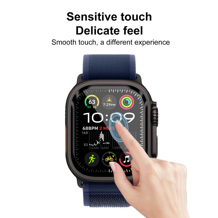 Apple Watch with screen protector being tapped on the display