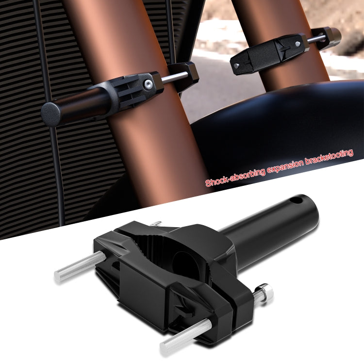 Black spotlight mounting bracket clamped to motorcycle frame with two rods