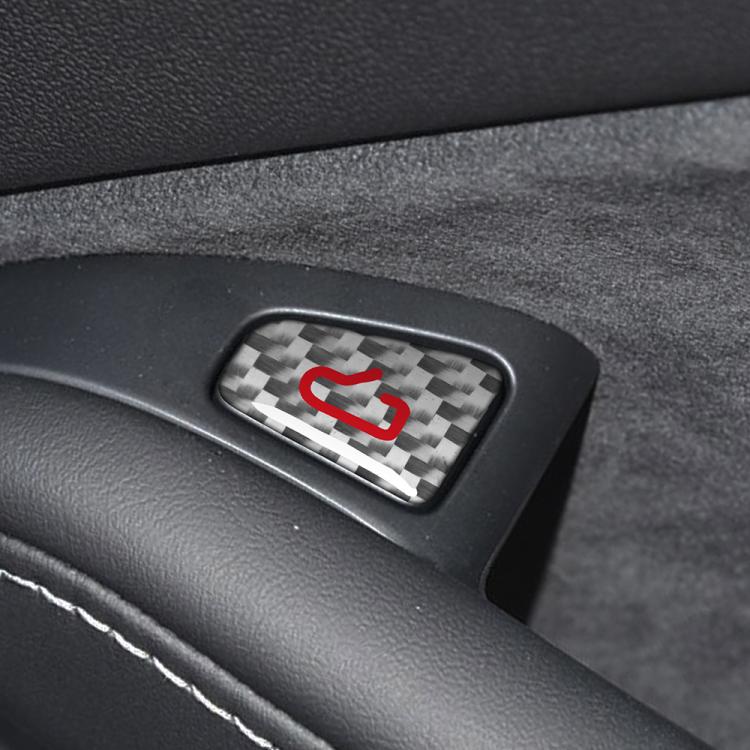 Carbon fiber checkered door switch sticker with red symbol on black interior trim