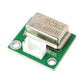 Crystal oscillator module with metal frequency can marked 15.600MHz on green board