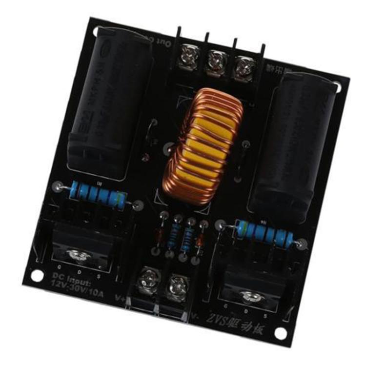 Wireless power driver PCB with copper coil, black capacitor blocks, and blue components
