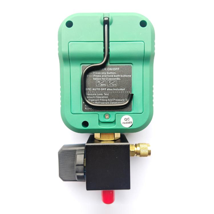 Digital manifold gauge with back panel controls, brass fitting and red push button