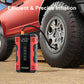 Red-and-black FOXSUR air compressor and jump starter next to a vehicle tire
