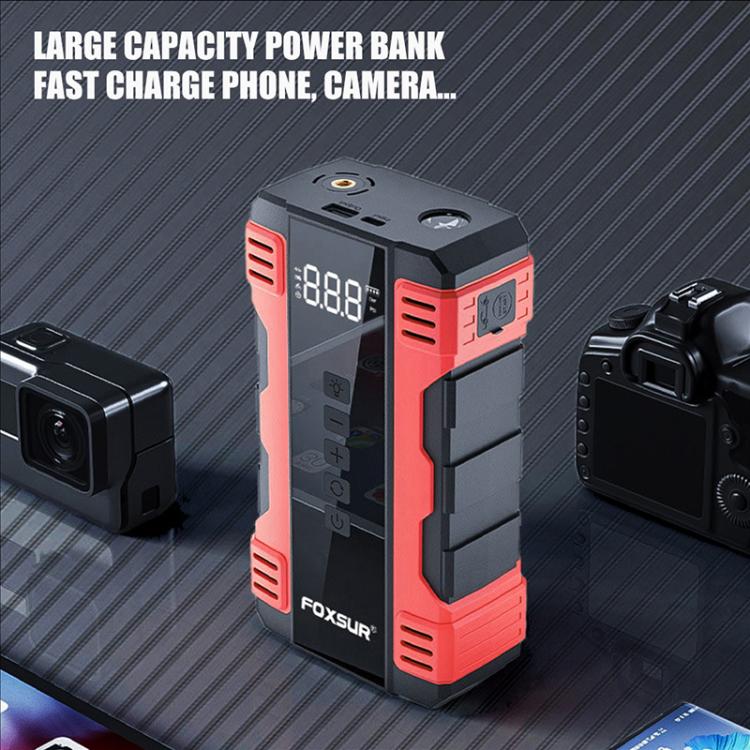 Red-and-black FOXSUR jump starter power bank with side ports and connected accessories
