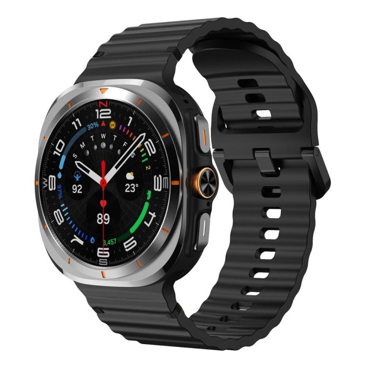 Black wavy-grain silicone watch band with stitched edges, shown attached to a smartwatch