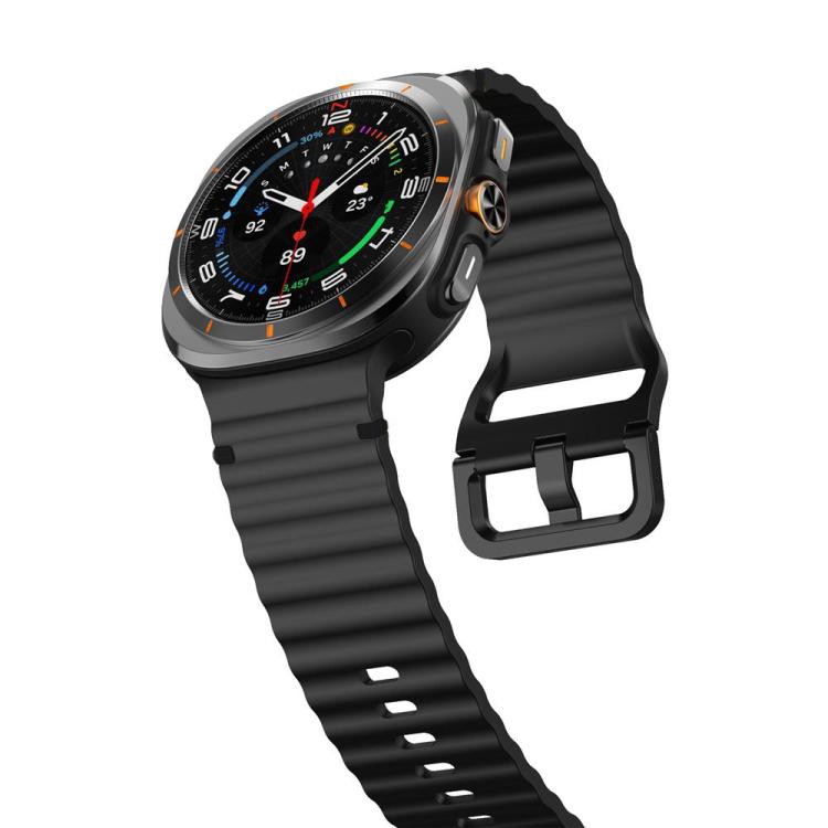 Black silicone watch band with wavy ridges and buckle, shown on a smartwatch