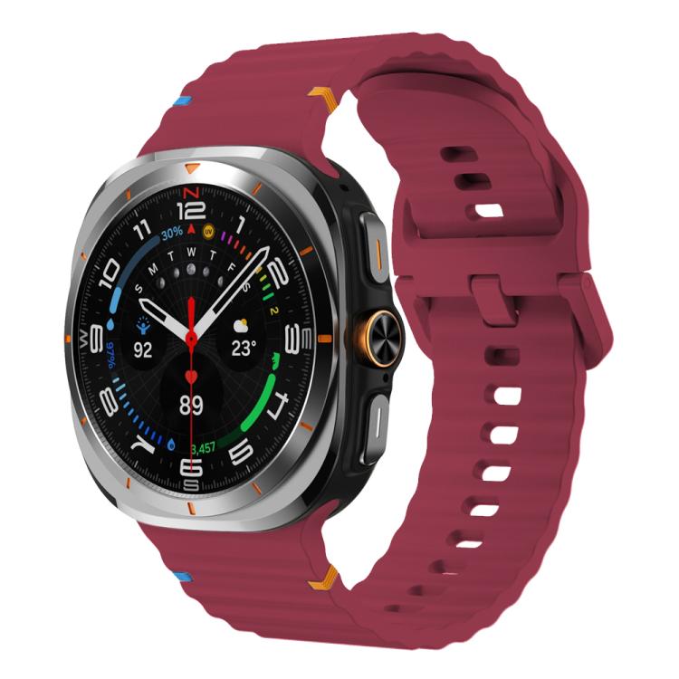 Wine red wavy-grain silicone watch band attached to a smartwatch