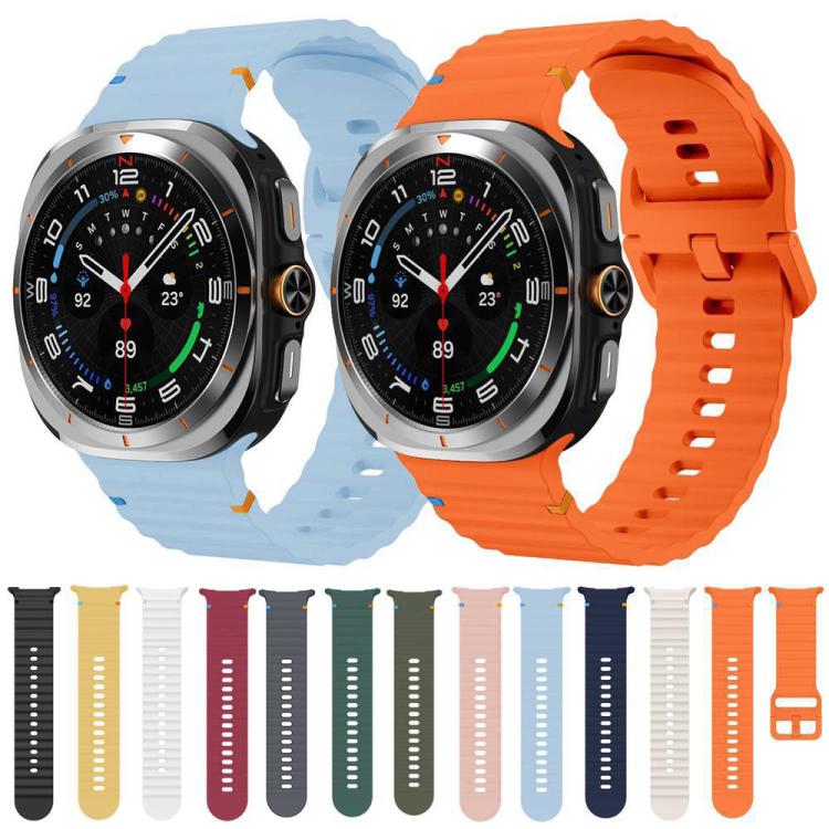 Silicone watch bands in assorted colors, with ridged texture and adjustable holes