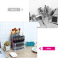 Clear 96-hole acrylic brush/pencil stand on a desk, pencils neatly organized