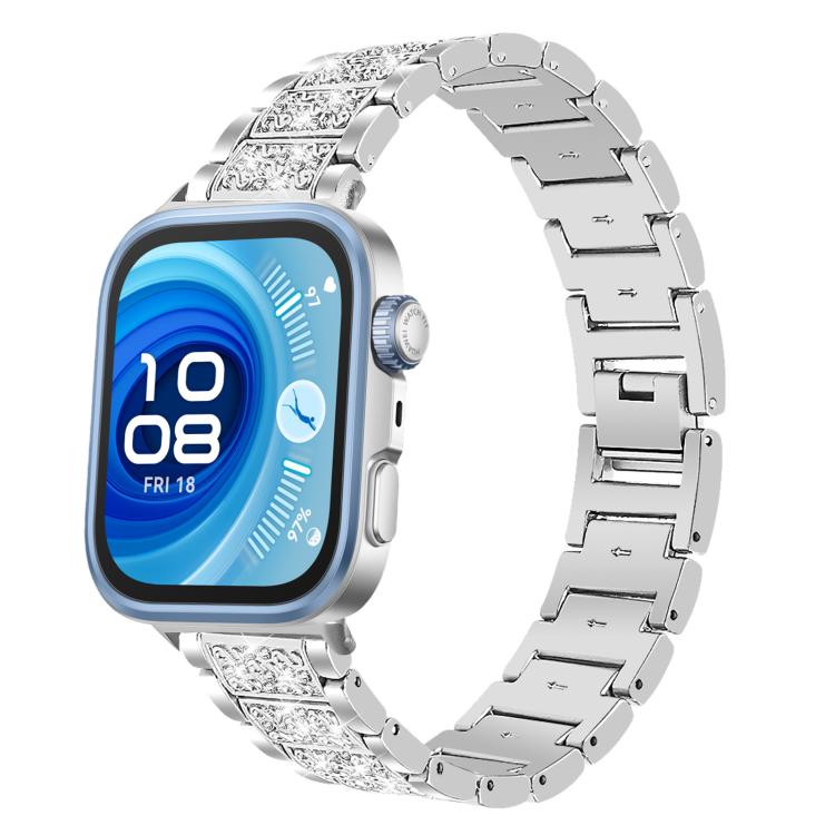 Silver stainless steel watch band with sparkling crystal links, shown on a square smartwatch.