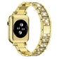 Gold stainless steel watch band with crystal accents, shown attached to a watch
