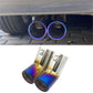 Stainless steel dual exhaust tailpipe with blue-tinted rim and two round outlets