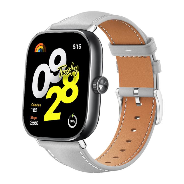 Grey leather watch band with tan lining, contrast stitching and silver buckle on a smartwatch
