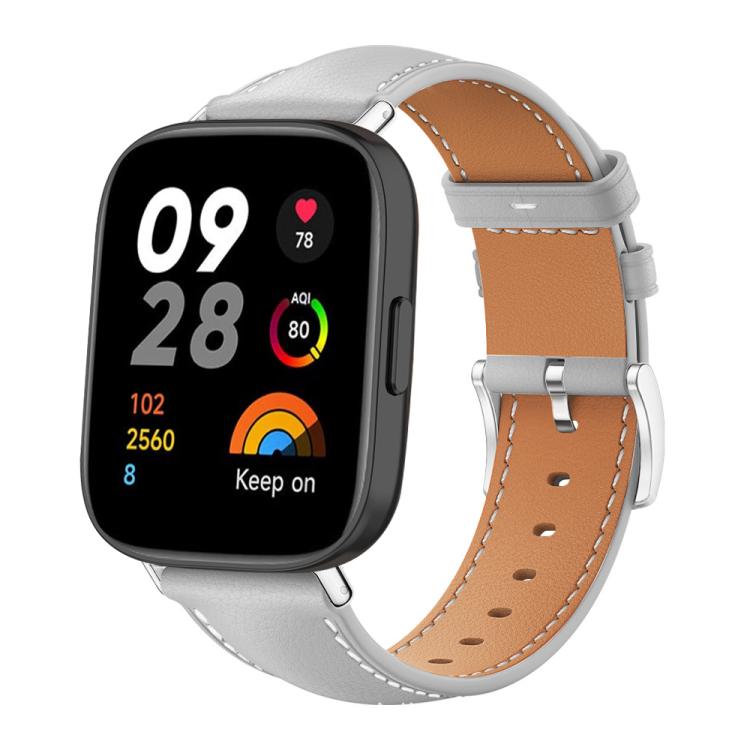 Leather watch band in light gray with tan lining, white stitching, and silver buckle, shown on a smartwatch.
