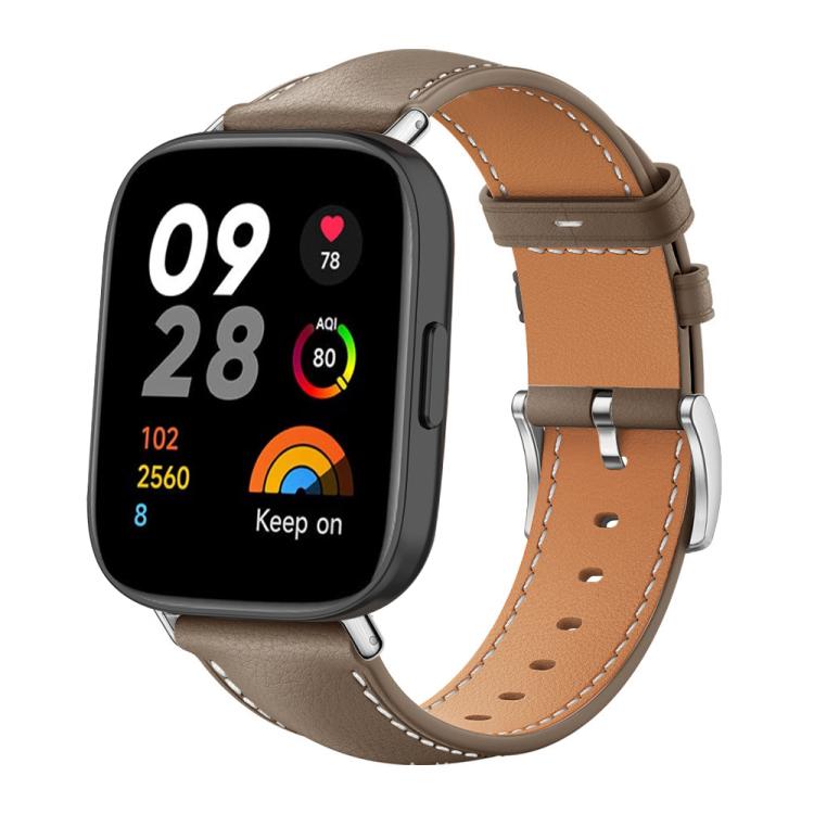 Leather watch band in taupe with tan lining, white stitching, and silver buckle, shown on a smartwatch.