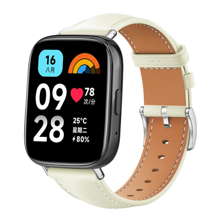 Cream leather watch band with tan lining, contrast stitching and silver buckle on a smartwatch with digital display
