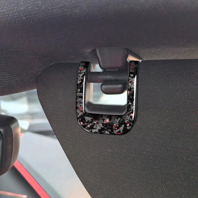 Car sun visor decorative sticker installed on interior trim, carbon-fiber style with red/black flecks
