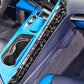 Car center console side decal strip set, black carbon-fiber with blue accents, left driver