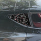 Rear triangle window decal pair in black carbon-fiber style with red reflective flares