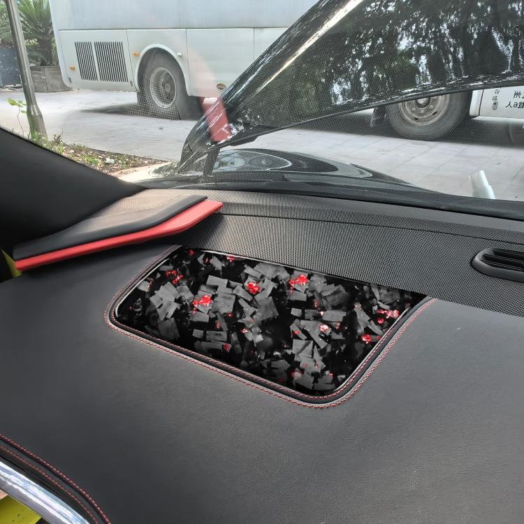 Carbon fiber-look passenger seat panel sticker with red accents, installed view