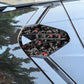 Rear roof camera decorative sticker on vehicle, black with red foil pattern