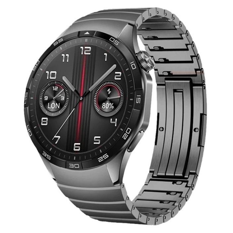 Dark gray stainless steel watch band with a Huawei smartwatch