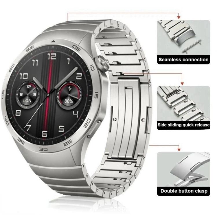Silver stainless steel watch band with linked bracelet and double-button clasp, shown on a watch