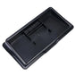 Black dashboard storage box with open interior and molded ridges, front view