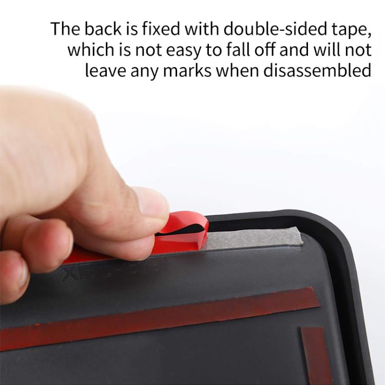 Dashboard storage tray with adhesive tape backing for secure mounting