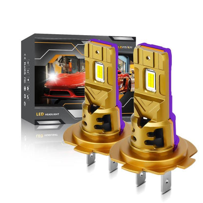 Two gold LED car headlight bulbs with purple heat-sink accents, shown with retail box