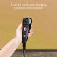 Black shaver with attached charging adapter cable and DC plug