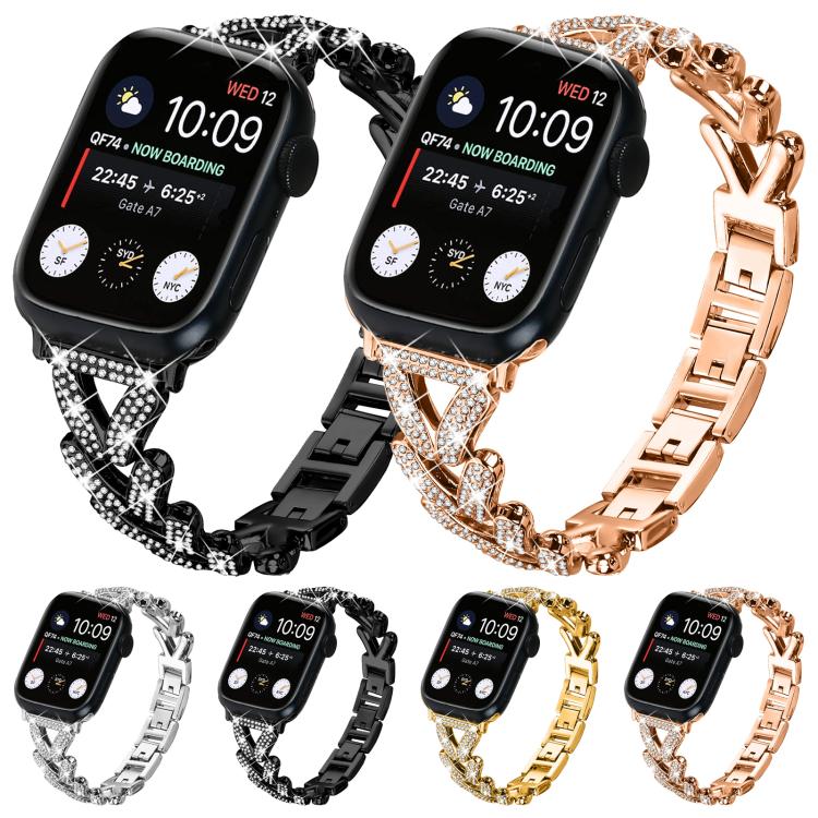 Apple Watch bands in silver, black, gold, and rose gold with crystal-set clover links