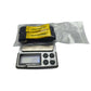 Manual door release pull strap set: two black straps with metal rings and yellow labels in bag