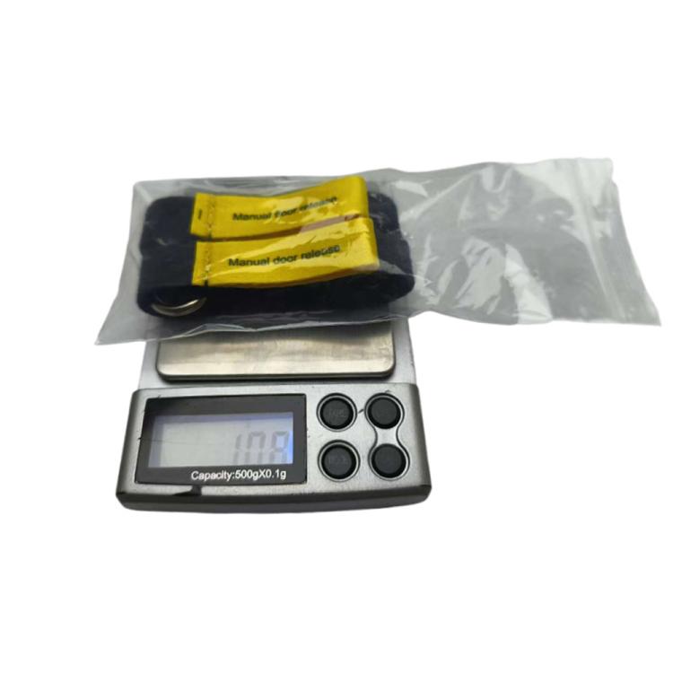 Manual door release pull strap set: two black straps with metal rings and yellow labels in bag
