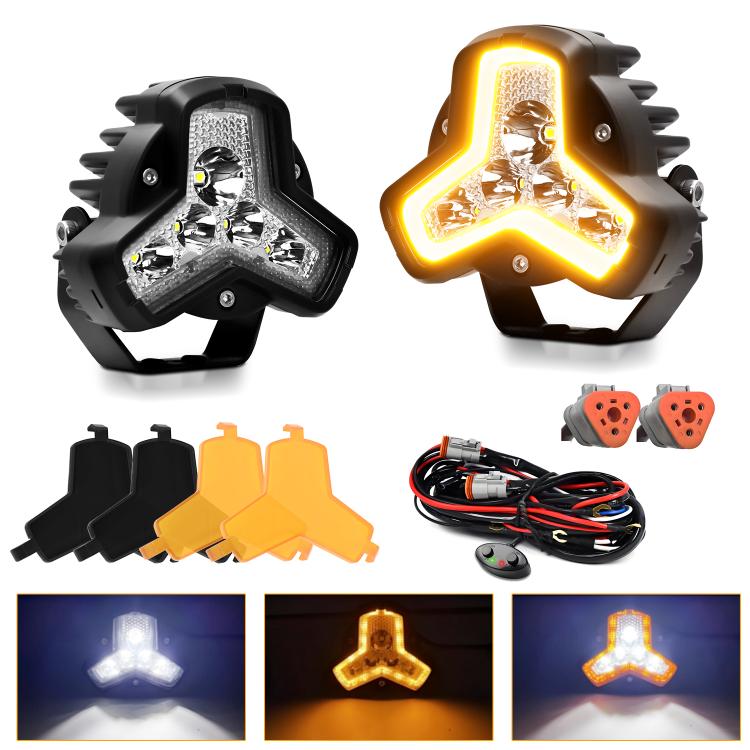 Pair of black triangular LED work lights with amber glow and mounting brackets