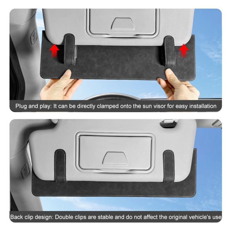 Black sun visor card extension clip with double clips, shown being clamped to the visor