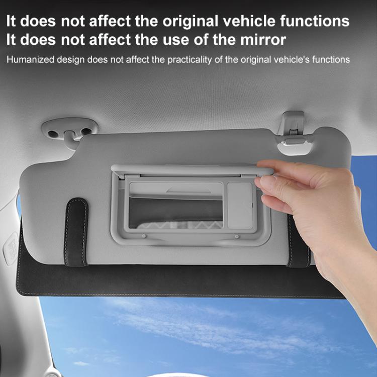Grey car sun visor card extension clip with hand lifting the front panel over the holder
